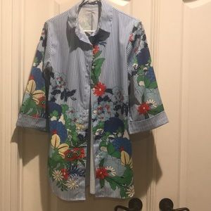 Colorful button down shirt in size medium.